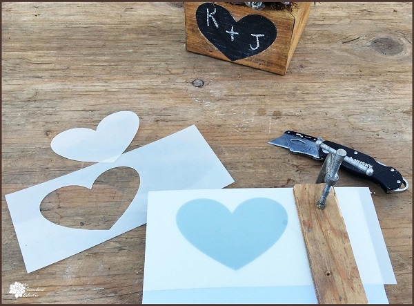 Valentine's Day DIY cutting out heart stencil