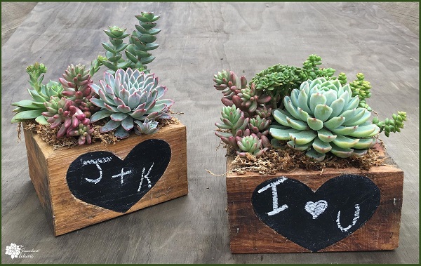 Valentine's Day DIY completed reclaimed wood planter with chalkboard heart