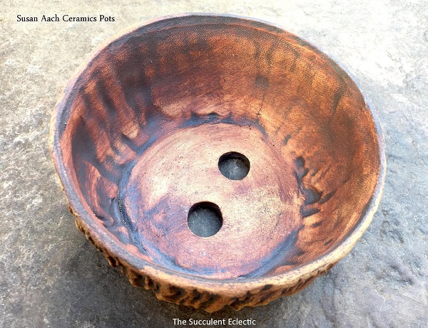 large drainage holes in Susan Aach ceramic pot for succulents