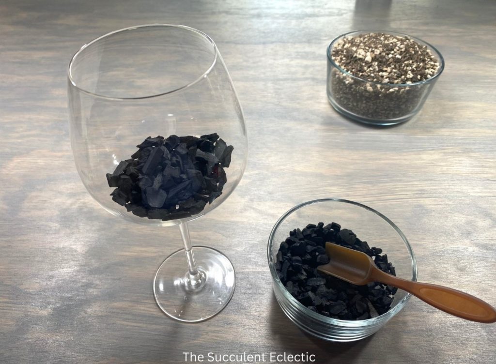 Add activated charcoal to base of the wine glass